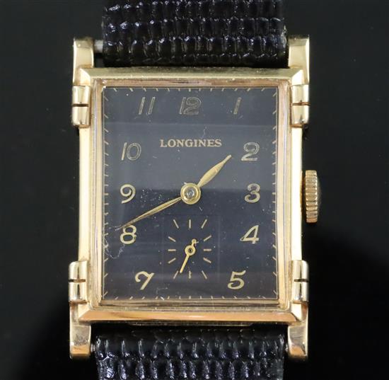 A gentlemans stylish 1930s 14k gold Longines manual wind wrist watch,